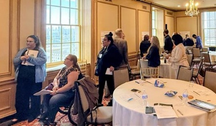 Participants at the NYSCAA conference fill out examples of the five guiding values and principles of trauma-informed care.