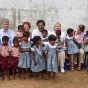 faculty with children in India. 